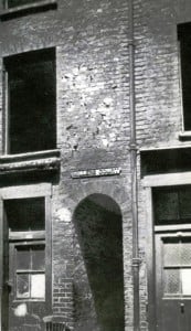 A photograph showing the arched entrance into Miller's Court.