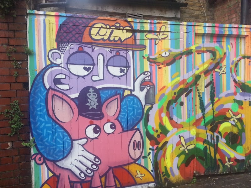 This portrait of a pig is on a wall off brick lane.