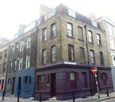 A house that stands on the junction of Wilkes Street and Princelet Street.
