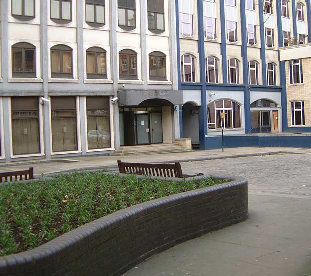 Looking diagonally left across Mitre Square towards the arch in 2003.