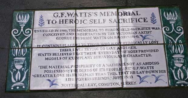 The ceramic tile giving information on the Watt's Memorial to heroiceself-sacrifice.