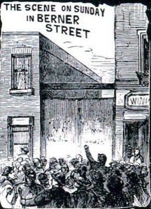 Crowds gather outside the entrance to Dutfield's Yard where Elizabeth Stride was murdered.