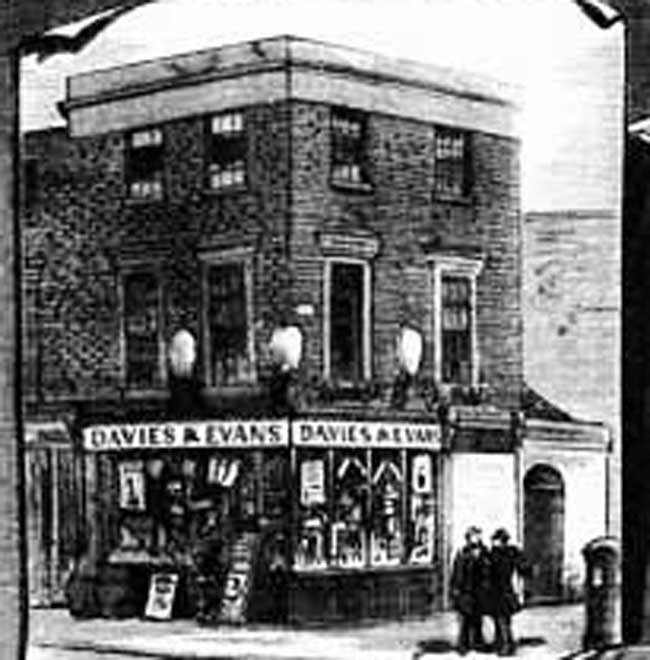 An illustration showing the exterior of Davies and Evans shop.