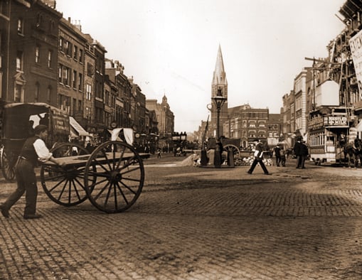 A view of St Mary's Church seen along Whitechapel High Street.