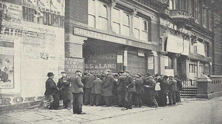 A group of men gather outside the Whitechapel Salvation Army Shelter.