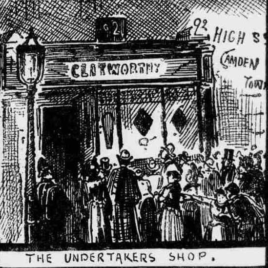 People outside the undertaker's shop.