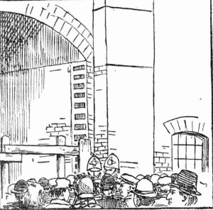 A crowd gathers around the Pinchin Street Arch.
