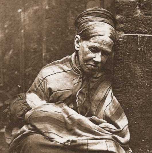A close up of the lady on the step.